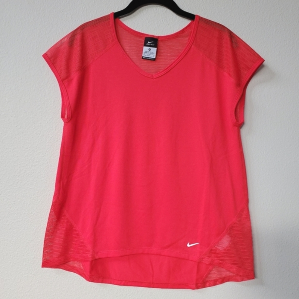 NIKE Dri-Fit Workout T with Mesh Paneling in Melon Red.